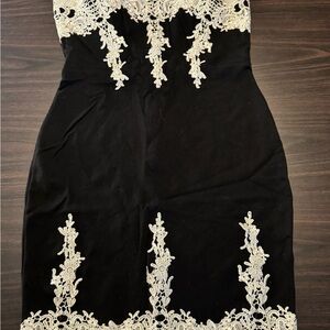 Elegant Black Dress with White Lace Detailing